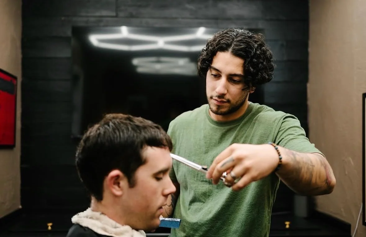 Jim cutting a client's hair at Annex Barber Shop